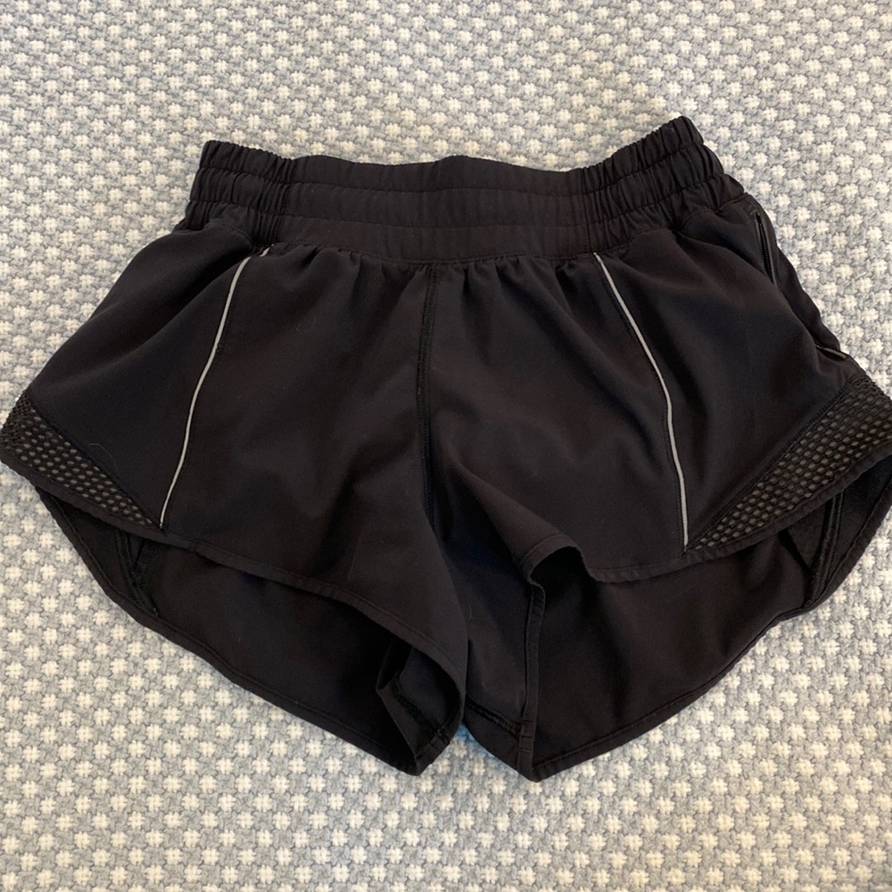 Lululemon black hotty hot shorts 2.5 with racing stripe down the back
